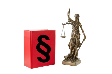 Book with paragraph sign and Lady Justice isolated on white background