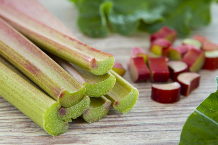 Fresh rhubarb on wooden backgroundの写真素材