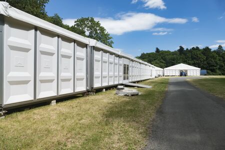 Large Exhibition Tent with glass door in Summer - Outdoor shot.の写真素材