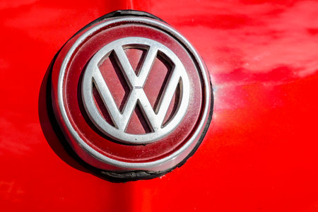BAD NAUHEIM, GERMANY AUGUST, 2017: Detail from red antique VW KARMANN GHIA Logo.のeditorial素材