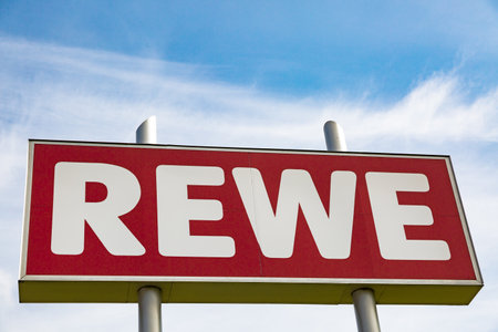 HUETTENBERG, GERMANY MAY, 2017: REWE supermarket chain sign. REWE is a GERMAN global discount supermarket chain, based in KÃ¶ln, Nordrhein-Westfalen, Germanyのeditorial素材