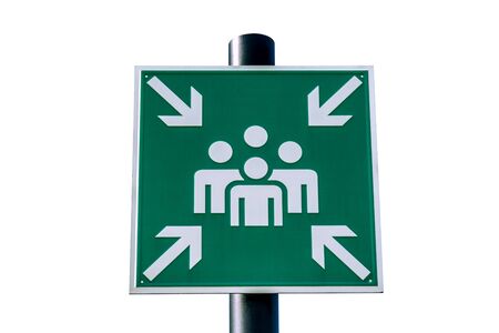 Emergency assembly point green sign on white backgroundの写真素材