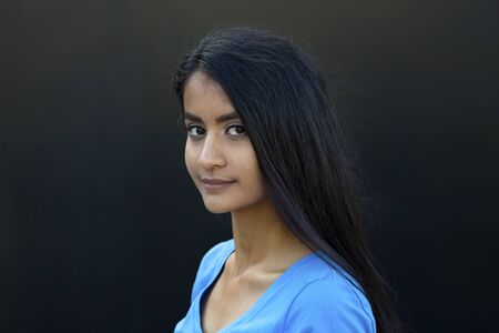 Portrait of young beautiful lady with magnificent dark hair. の写真素材