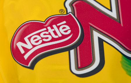 HUETTENBERG, GERMANY- JUNE 7, 2018: NESTLE Logo of Bar of NUTS Chocolate in Detail.
