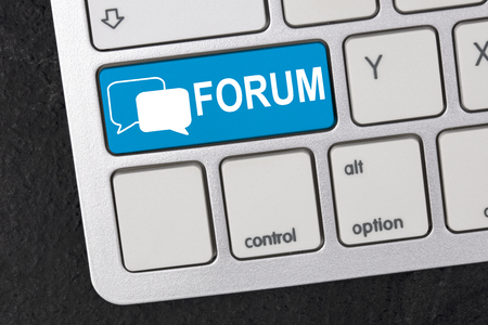 Keyboard in Detail with graphic shows a logo with two speech bubbles and the word Forumの写真素材