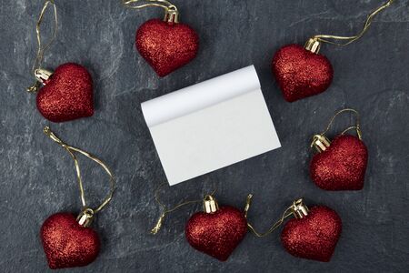 Overview from christmas hearts decorations and a blank calendar