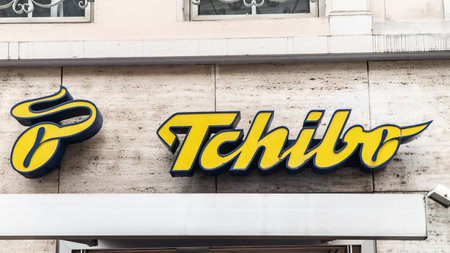TRIER,  GERMANY - SEPTEMBER 13 2019: TCHIBO logo on a facade. TCHIBO is a coffee roasting chain based in Hamburg.のeditorial素材