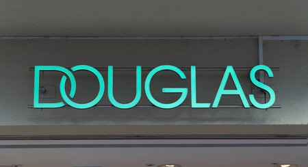 TRIER, GERMANY - SEPTEMBER 13, 2019:   perfumery Douglas window store with premium brand products, perfumery chain Douglas focuses on retailing various premium perfume, fragrance, care, makeupのeditorial素材