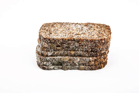 Moldy whole-grain bread Bread isolated on white background