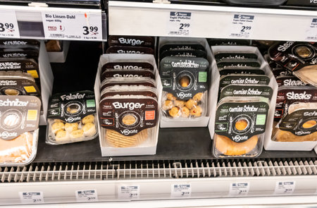 WETZLAR, GERMANY-2020-08-27: Vegetarian and vegan products on a sales shelf with price tagsのeditorial素材