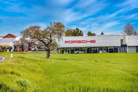 GIESSEN, GERMANY 2021-05-08: Porsche Center GIESSEN-WETTENBERG Porsche is a German automobile manufacturer specializing in high-performance sports cars, SUVs and sedans.のeditorial素材