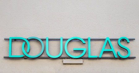 OBERURSEL, GERMANY 2021-04-27 View on sign with logo lettering of douglas perfumery at facadeのeditorial素材