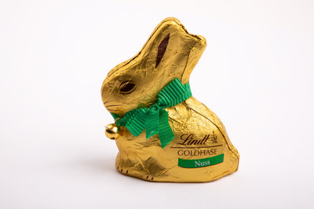 HUETTENBERG, GERMANY, 2021-04-04: Lindt Gold Bunny. Dressed in gold, with a ribbon and golden bell that rings, it is the traditional Lindt Easter chocolate.のeditorial素材