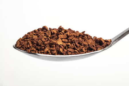 Instant Coffee on a Teaspoon over whitebackgroundの写真素材