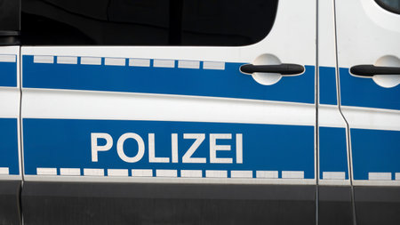 WETZLAR, GERMANY - 2020-12-27: Side view of a typical German police car with lettering "Polizei" on blue background. Wetzlar, Germanyのeditorial素材