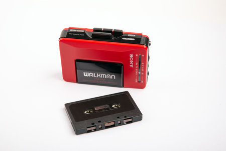 HUETTENBERG, GERMANY - 2021-04-07: Beautiful red vintage SONY WALKMAN WM-24 over bright background.のeditorial素材