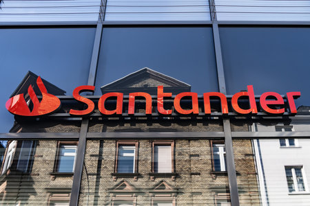 GIESSEN, GERMANY - 2021_04_09: A sign for a Santander Bank outlet in the city GIESSEN.のeditorial素材
