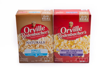 WETZLAR, GERMANY 2021-11-21: A box of Orville Redenbacher Microwave Popcorn. The brand launched in 1970 features the likeness of founder and spokesman Orville Clarence Redenbacher.のeditorial素材