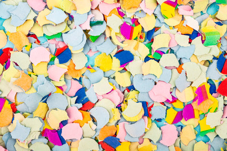 Full frame shot in studio from above shows colorful confetti.の写真素材