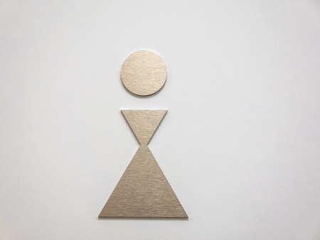Modern abstract Lady symbol on toilet doorの写真素材