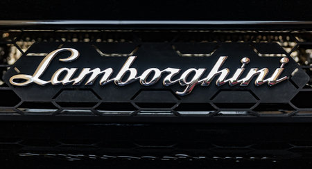 WETZLAR, GERMANY 2022-04-23: Lamborghini chrome lettering on Lamborghini car displayed.