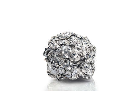 Crumpled Aluminum Foil over white backgroundの写真素材