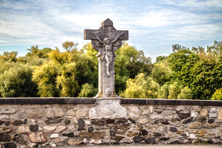 Stone Jesus on Bridge in Limburg Hesse on a sunny dayの写真素材