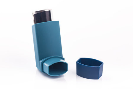 Blue Metered Dose Inhaler isolated over white backgroundの写真素材