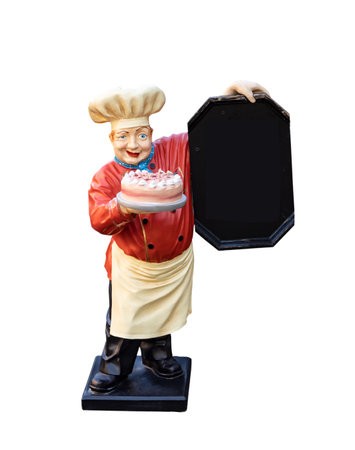 A cook figure with colorful cake holds a blank black board isolated on white background.の写真素材