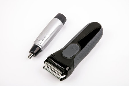 Electric Shaver and Nose Trimmer over bright backgroundの写真素材