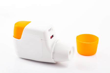 Metered dose of inhaler isolated over white backgroundの写真素材