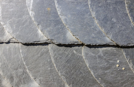 Slate on facade in detail as backgroundの写真素材