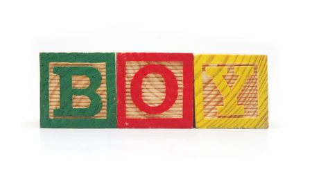 Isolated Wood Alphabet Blocks Spell the Word BOY
