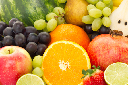 A heap of many different tropical fruits. Healthy food and nutrition, vegan lifestyle and organic fair trade concept.の写真素材