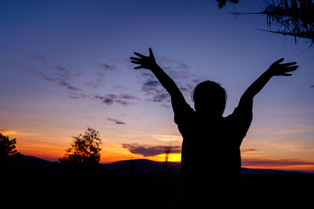 silhouette girl at twilight timeの写真素材