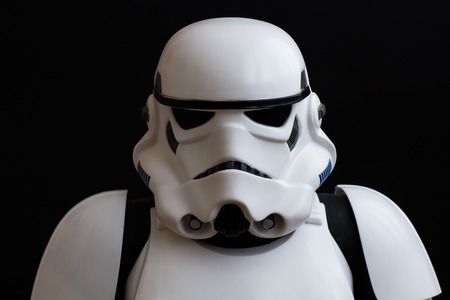 YORK, UK - JUNE 1, 2016. A close up portrait of a Star Wars Stormtrooper from The Force Awakens movie on a black background.のeditorial素材