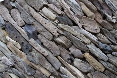 An art background made from grey driftwood arranged in a diagonal pattern.の写真素材