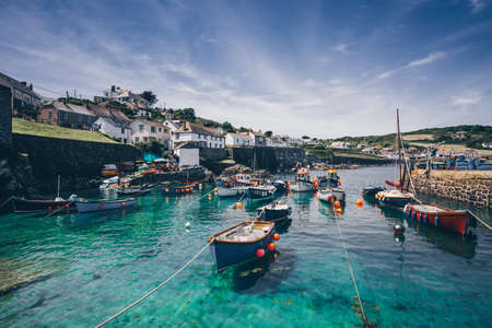 A view of the picturesque harbour and fishing village of Coverack in Cornwall, UK on a summer vacation holidayのeditorial素材