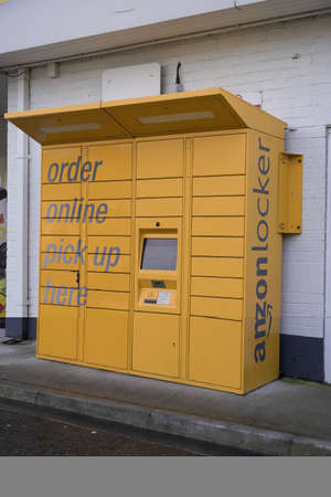 DONCASTER, UK - JANUARY 29,, 2021.  An Amazon Locker which is a secure kiosk where people can pick up their parcel or package with convenienceのeditorial素材