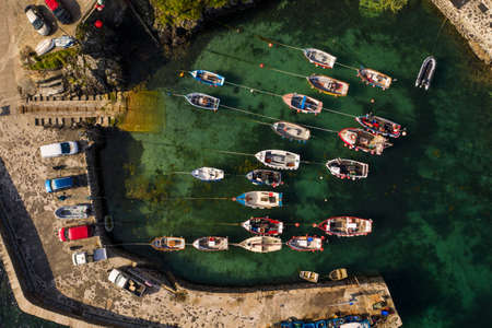 COVERACK, CORNWALL, UK - JUNE 30, 2021.  Aerial view of the picturesque harbour and village of Coverack in Cornwall, UKのeditorial素材
