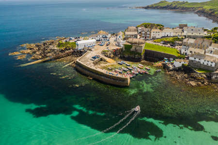 COVERACK, CORNWALL, UK - JUNE 30, 2021.  Aerial view of the picturesque harbour and village of Coverack in Cornwall, UKのeditorial素材