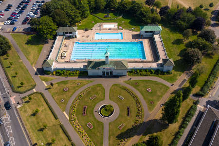 PETERBOROUGH, UK - SEPTEMBER 6, 2021.  An aerial view of the Peterborough Vivacity Lido which is a popular outdoor swimming pool in Summer sunshineのeditorial素材
