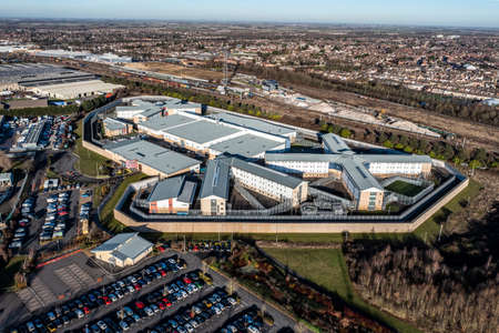 PETERBOROUGH , UK - JANUARY 17, 2022.  An aerial view showing the buildings and grounds of HMP and YOI Peterborough which is the only purpose built prison to house both male and femal inmatesのeditorial素材