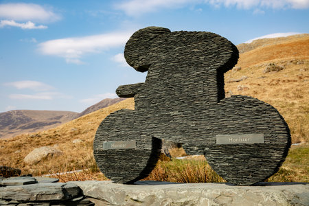 A model racing cyclist made from slate at The Honister Slate Mine and museum in The lake District national Park shows the versatility and strength of this building materialの写真素材
