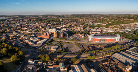 ROTHERHAM, UK - JULY 7, 2022.  An aerial view of Rotherham cityscape in South Yorkshire with The New York Football Stadium which is hosting the Women's Euro 2022 football championshipsのeditorial素材
