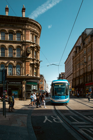 BIRMINGHAM, UK - JULY 18, 2022.  A West Midlands Metro Tram travelling along tracks on the city streets of Birmingham city centreのeditorial素材