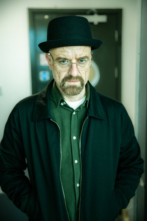 A male cosplayer dressed as Walter White or Heisenberg as portrayed by the American actor Bryan Cranston at a UK comic con eventの写真素材