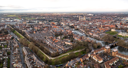 An aerial cityscape view of the city of York the ancient city walls and York Minster in the backgroundの写真素材
