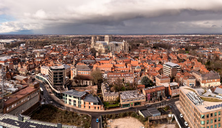 An aerial landscape view of York cityscape skyline in North Yorkshire, UK with York Minster cathedral and the rooftop of historic buildingsの写真素材