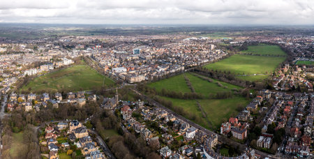 An aerial cityscape of Harrogate town with The Stray public park and Victorian architectureの写真素材